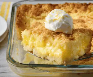 Tangy Lemon Cream Cheese Dump Cake with Buttery Crust