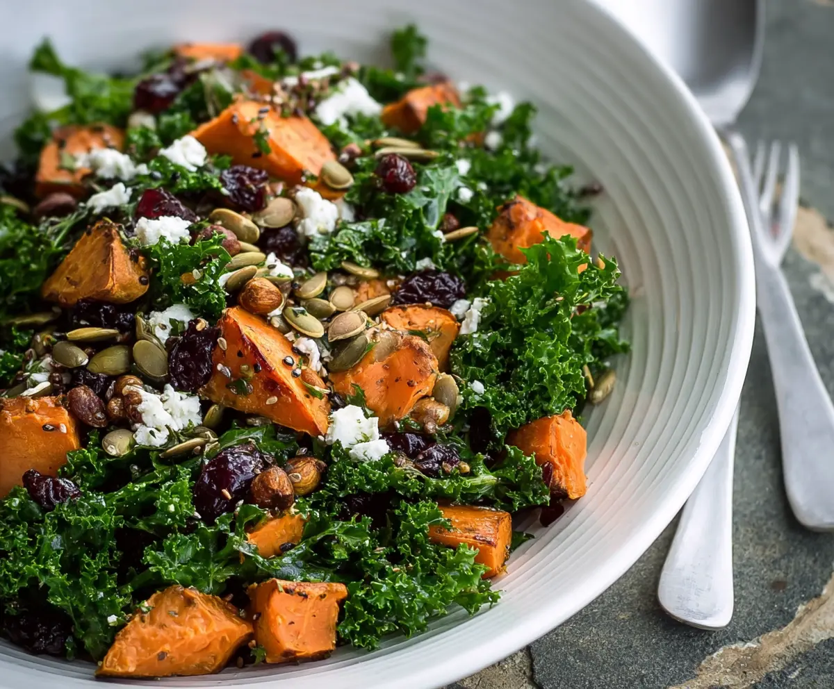 Vibrant Kale and Roasted Sweet Potato Salad served in a bowl for a healthy meal.