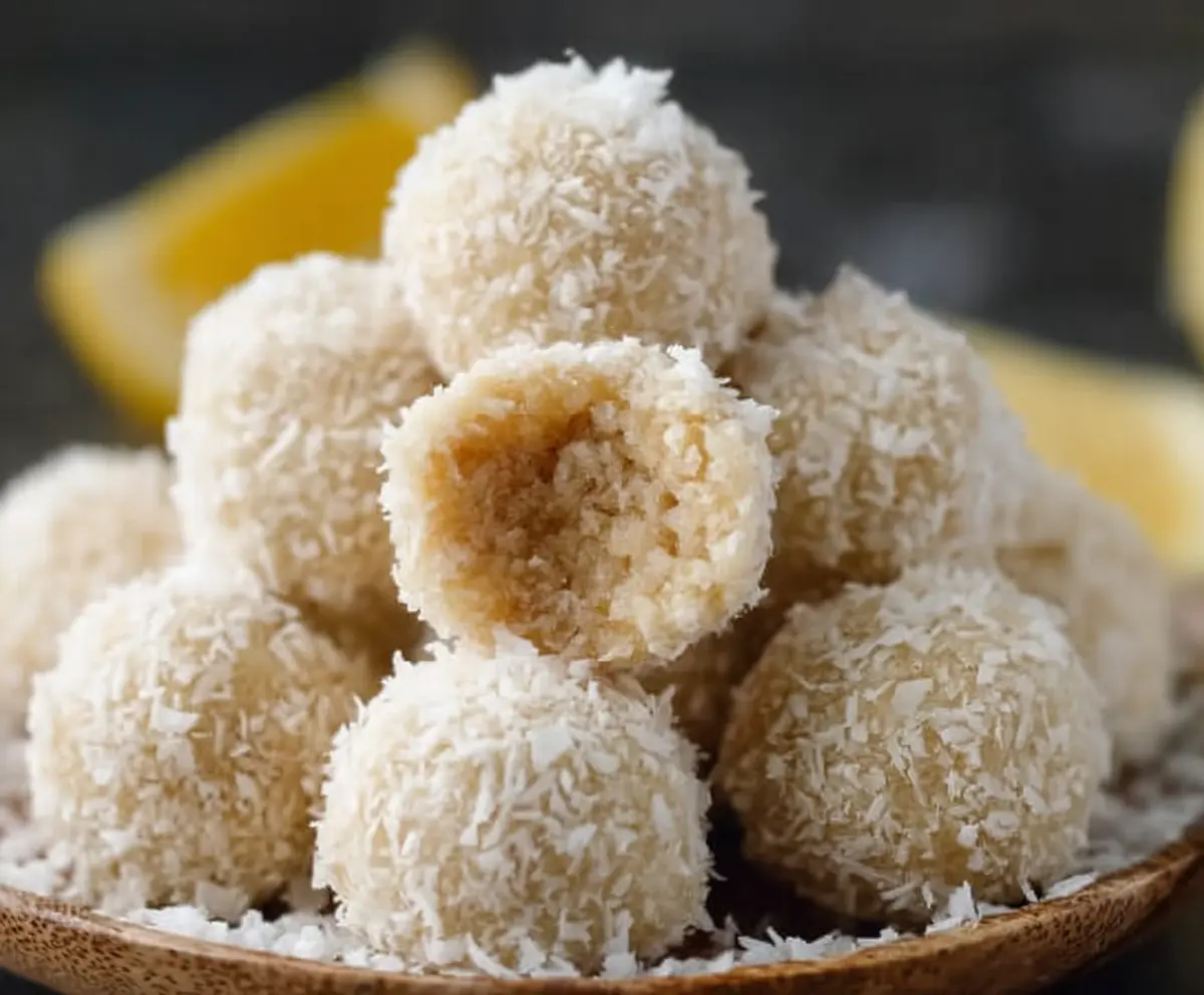 Healthy lemon coconut protein balls close-up, perfect for a nutritious snack or post-workout treat.