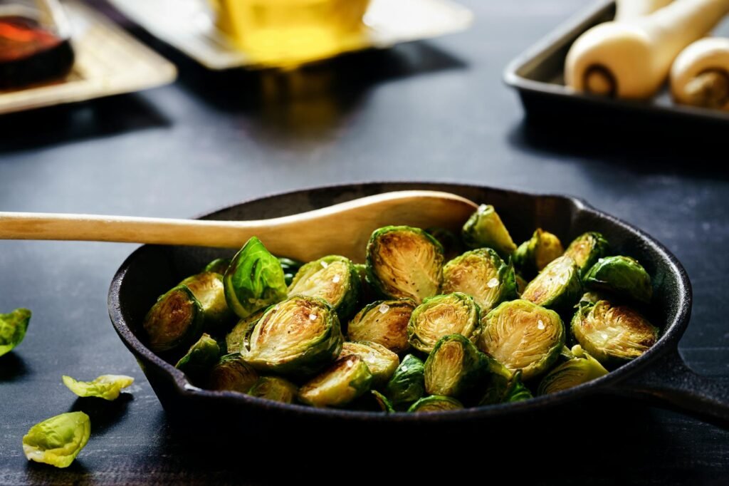 Roasted Brussels sprouts with dark edges on a sheet pan