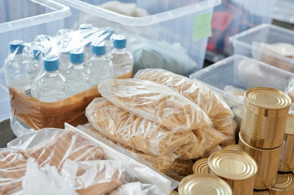 Portions of leftover soup in shallow containers ready for the refrigerator.