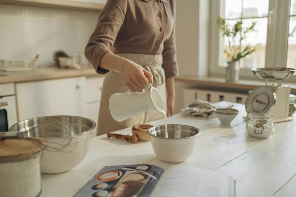 A digital kitchen scale weighing flour for cookie dough