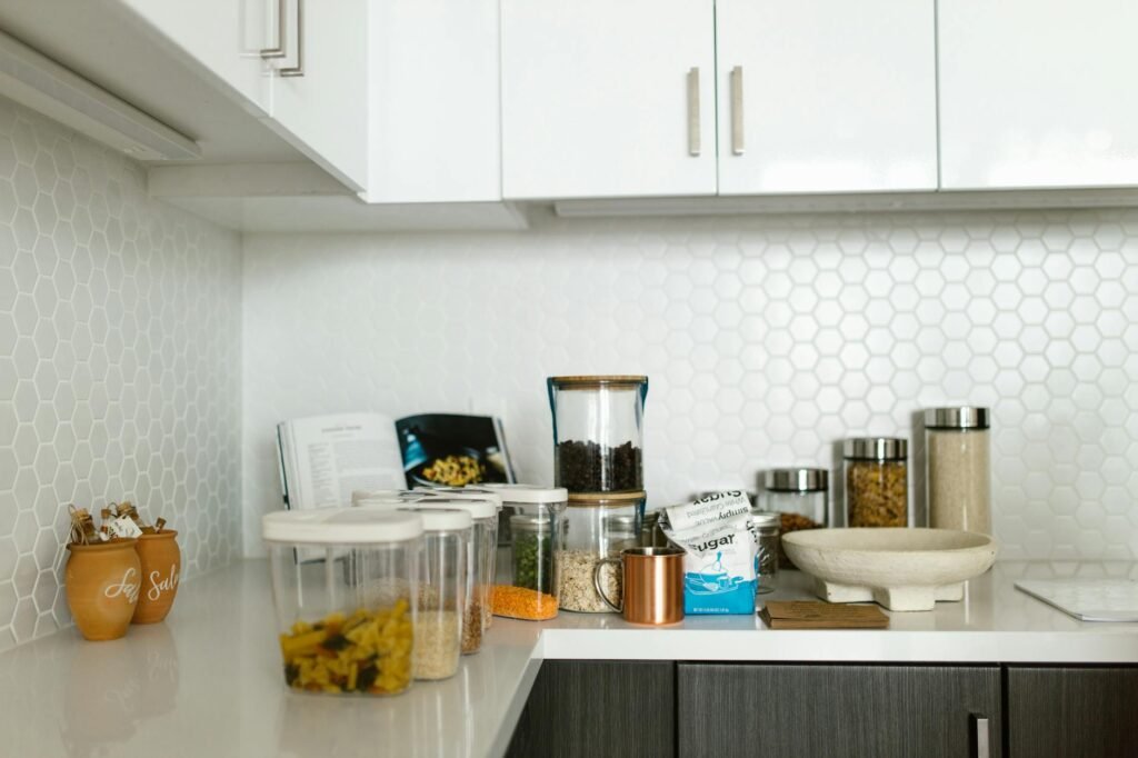 Shallow containers of leftovers stored neatly in a refrigerator